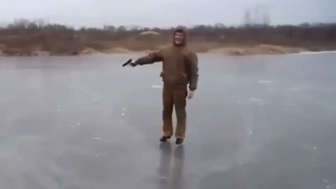 Watch What Happens When This Man Fires A Gun At A Frozen Lake