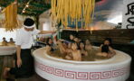 Inside this Japanese spa you can relax in a bath full of noodles!