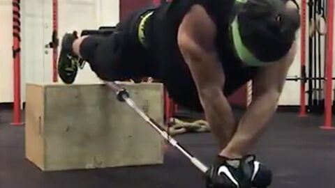 Watch This Man Take Ab Wheel Rollouts To The Next Level