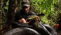Watch this naturalist get swallowed whole by an anaconda