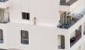 Terrifying Moment a Toddler Faced Death Walking on the Ledge of a Building