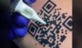 COVID: Man tattoos proof of vaccination QR code on arm