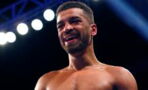 Boxer Sam Maxwell Demonstrates a Uppercut...by Giving Himself a Black Eye