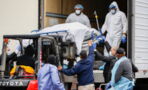 Footage captures New York City hospital using truck for body removal of coronavirus victims