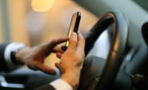 Use of handheld mobile while driving to become illegal next year