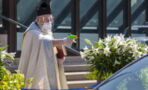 In Detroit, a Priest Is Battling Coronavirus With a Squirt Gun