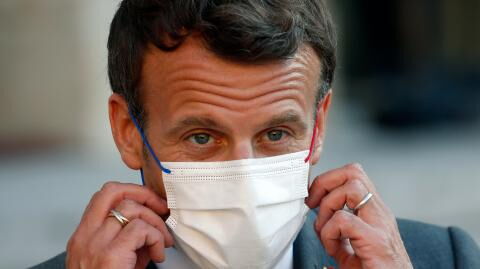 French President Emmanuel Macron slapped during a public meeting with locals