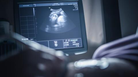 The woman had a baby growing inside her liver