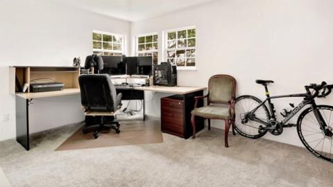 A Man Took a Photo of His Deserted Office but Two Details Revealed That He Wasn’t Alone
