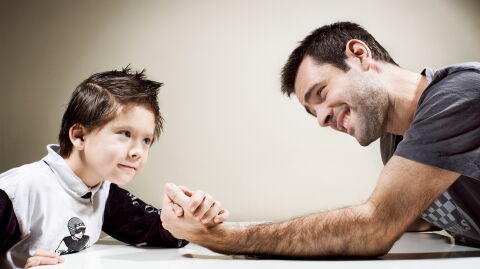 Father’s Young Son Beats Him in Arm Wrestling – That's When He Went for His Gun