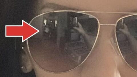 She saw something terrifying in the reflection in her sunglasses while taking a selfie
