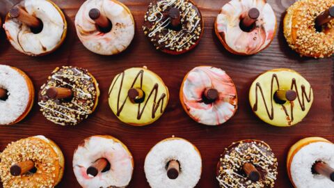 Krispy Kreme is offering football fans a dozen free donuts only today