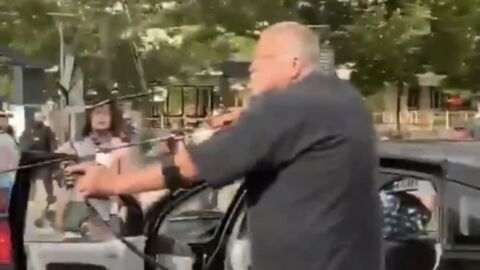 BLM: Man Points Bow and Arrow at Protesters to 'Help' Police at Protest