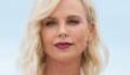 Charlize Theron Completely Changed With A Bold Look With Her Platinum Pixie Cut And Fishnet Dress