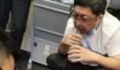 A Chinese doctor saves a man’s life mid-flight by sucking urine from his bladder