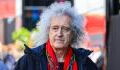 Queen guitarist Brian May reveals he suffered a ‘minor stroke’: ‘I didn’t have any control over left arm’