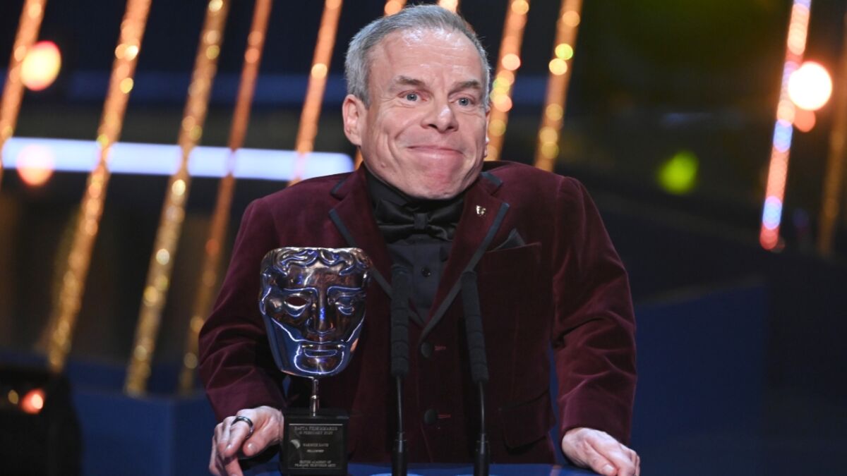 Warwick Davis gives emotional tribute to wife as he receives BAFTA Fellowship Award