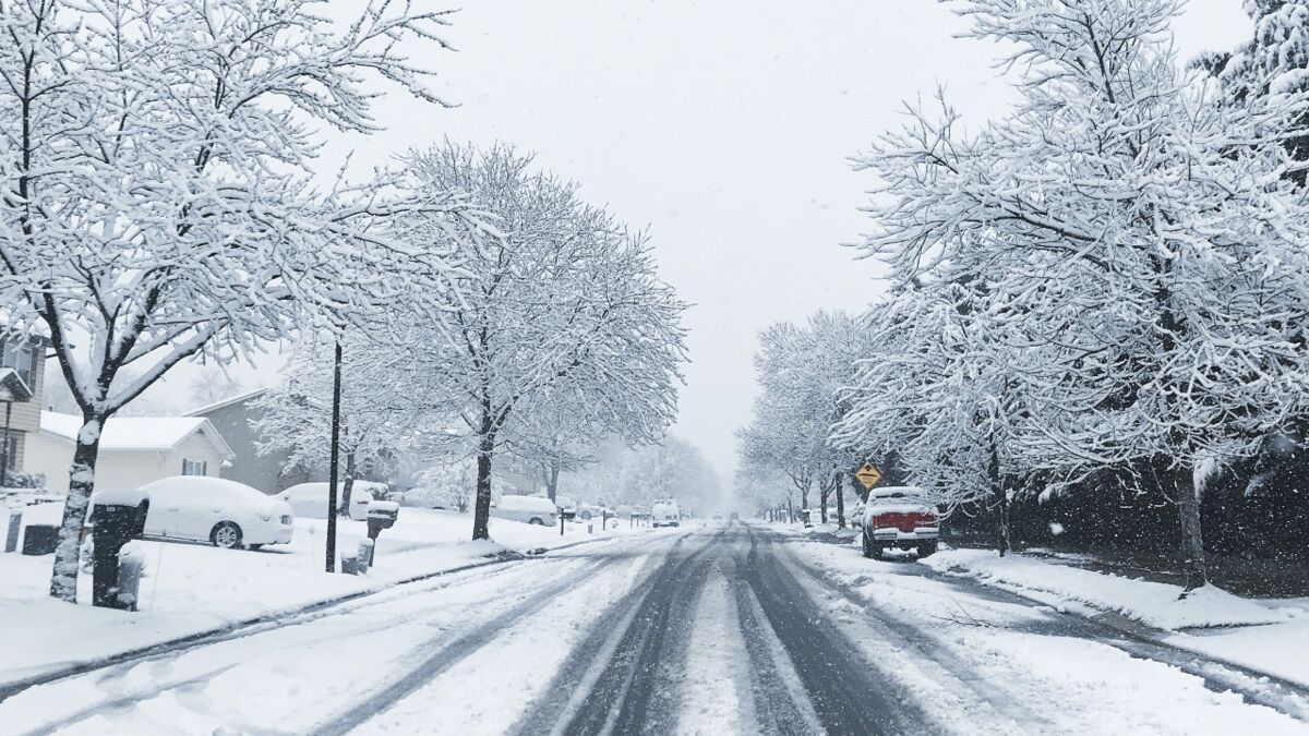 ‘Hazardous’ weather warning as snow sweeps UK, here’s how long it