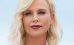 Charlize Theron Completely Changed With A Bold Look With Her Platinum Pixie Cut And Fishnet Dress