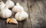 Here is how eating garlic can help slim you down