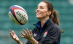 Kate Middleton captured getting down and dirty while playing rugby