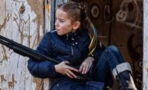 War in Ukraine: This photo of an armed girl is not what you think