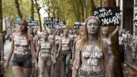Femen Activists Dressed Up Like Zombies And Hit The Streets Of Paris