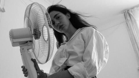 Here's how much it costs to sleep with a fan on vs. air conditioning