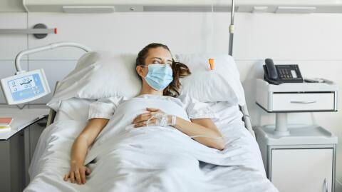 Omicron: NHS raises alert to highest level as new variant takes over UK