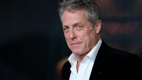 Hugh Grant opens up about how becoming a father changed him: 'Suddenly I had heart'