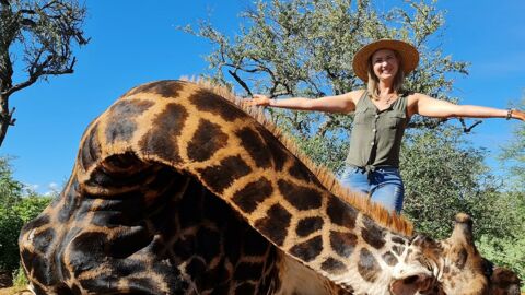 For Valentine's Day, she poached a giraffe and posed with its still bloody heart