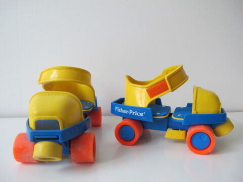 12. Patins à roulette Fisher Price