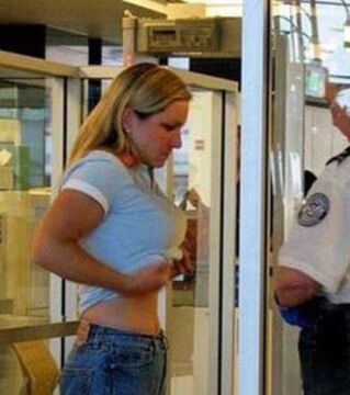 'Alright ma’am, you can put your shirt back down'