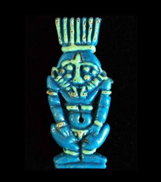 Earthenware amulet representing the god Bes, god of the home and often associated with children and pregnant women.