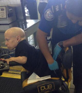 Even celebs aren’t safe from the TSA: Here we see Vern Troyer receiving quite the search and he doesn’t seem too impressed…