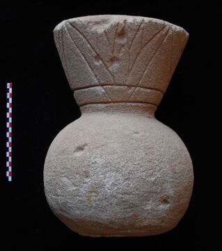 This stone adorned the tops of the pyramids found in Sudan. It is engraved with a motif representing a lotus flower