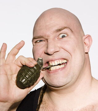 It’s impossible to pull the pin of a grenade with your teeth. All you’d be risking by doing so is a trip to the dentist.