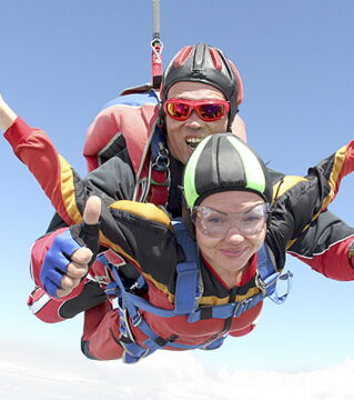 It’s not possible to hold a conversation during a freefall while parachuting. The force from the fall and the wind cause far too much noise for even the smallest verbal exchange.