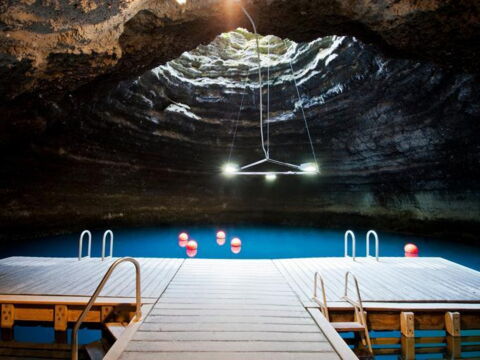 This pool is located underneath a crater! How interesting. It's the Homestead Crater in Utah and it's a must visit.