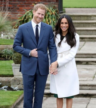 2. The beautiful couple make their official engagement announcement and Meghan wore a stunning white belted coat from LINE. The cost is about £560.