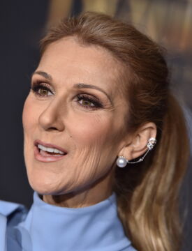 Celine Dion dares to show off her few grey hairs