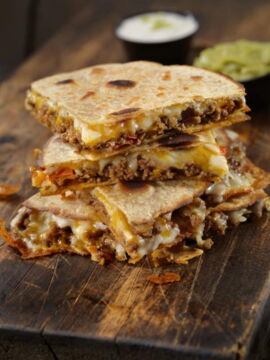 Pastillas with cheese, meat and tomato