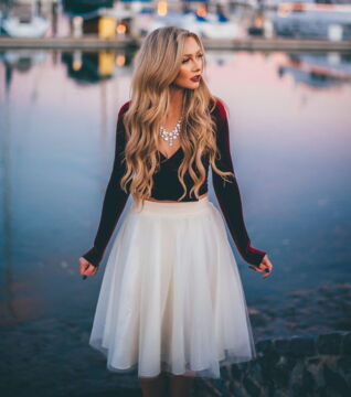 Wear the tulle skirts with a crop top and a beautiful necklace. This will make you stand out of the crowd! It's the perfect look for a night out of town.