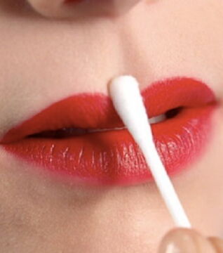 Use a cotton swab to help blend your lipstick at the lip line. You can also use it to clean up excess lipstick on your skin.