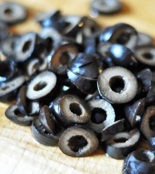 Olives: Both green and black olives grow from the same tree and all olives start from green then slowly turn black as it rippens. Black olives are actually the green olives that have been cured using diluted brine and lye.