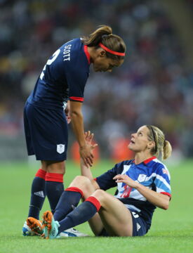 She dated teammate Kelly Smith