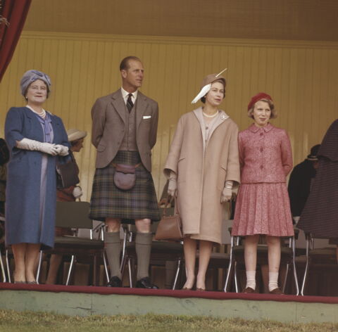 Princess Anne, her grandmother and her parents in 1961