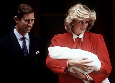 The Prince and Princess of wales are pictured here with their second child, Prince Harry, after his birth in 1984.