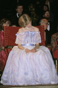 Magnificent even when asleep, here is Princess Diana in a pretty purple dress