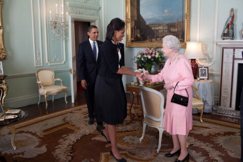 Michelle Obama put her arm around the Queen